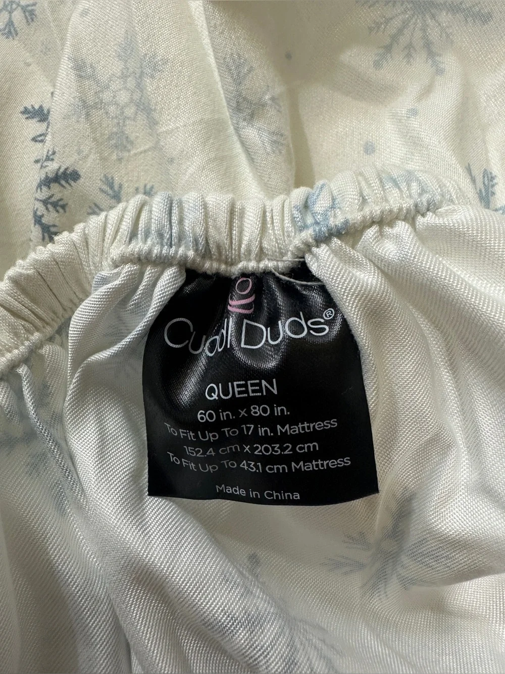 Cuddl Duds White Bedding with Light Blue Snowflake Motif